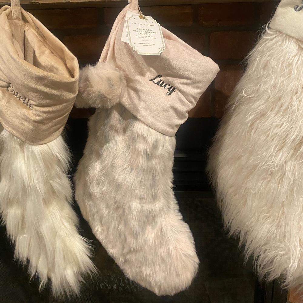 Pottery Barn Stocking with the name “Lucy”. 
Blush color. Brand NEW with tags!
